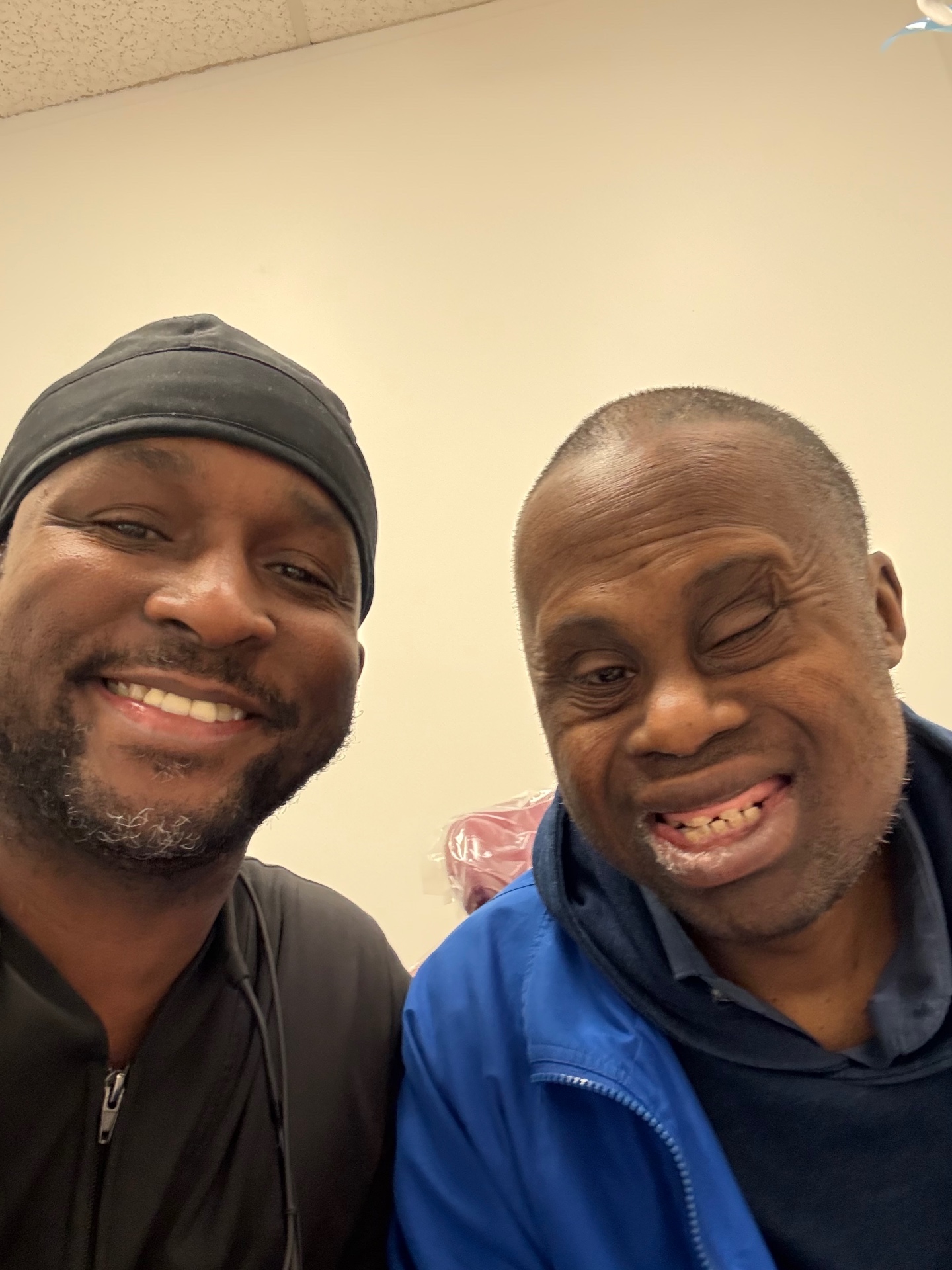 Dr. Baawo with a smiling patient